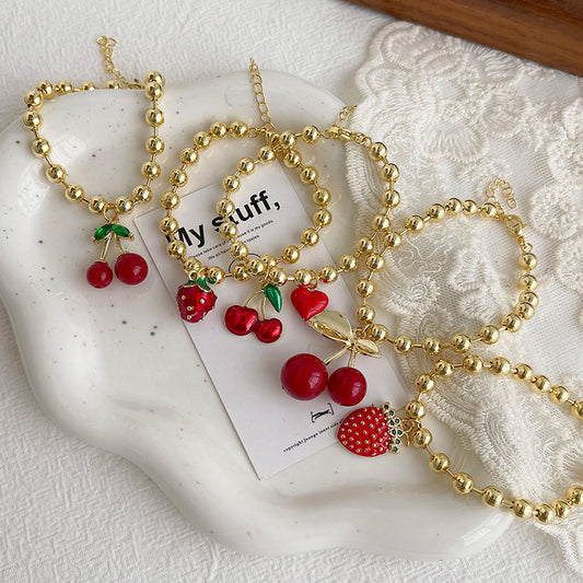 Pulsera de Bolitas con Fresa