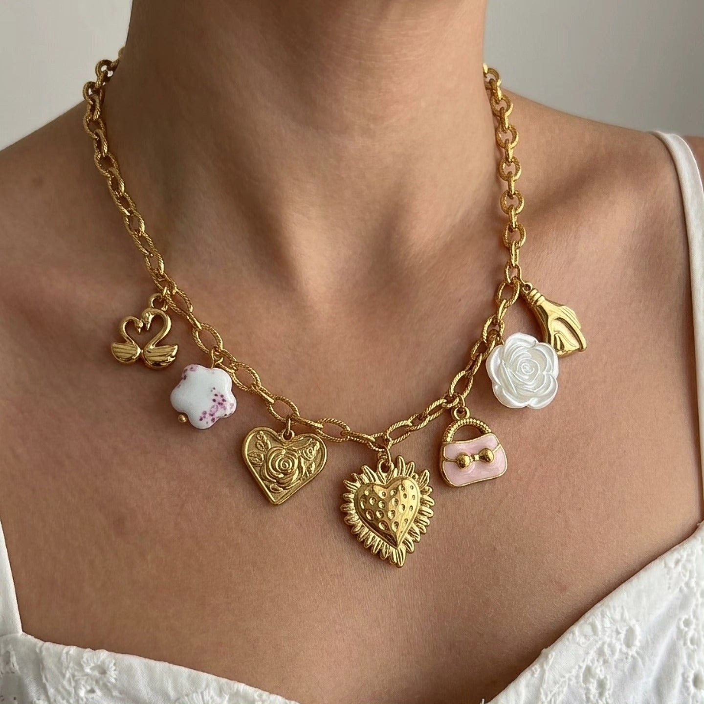 Collar Multi Dijes de Corazon y Bolsita