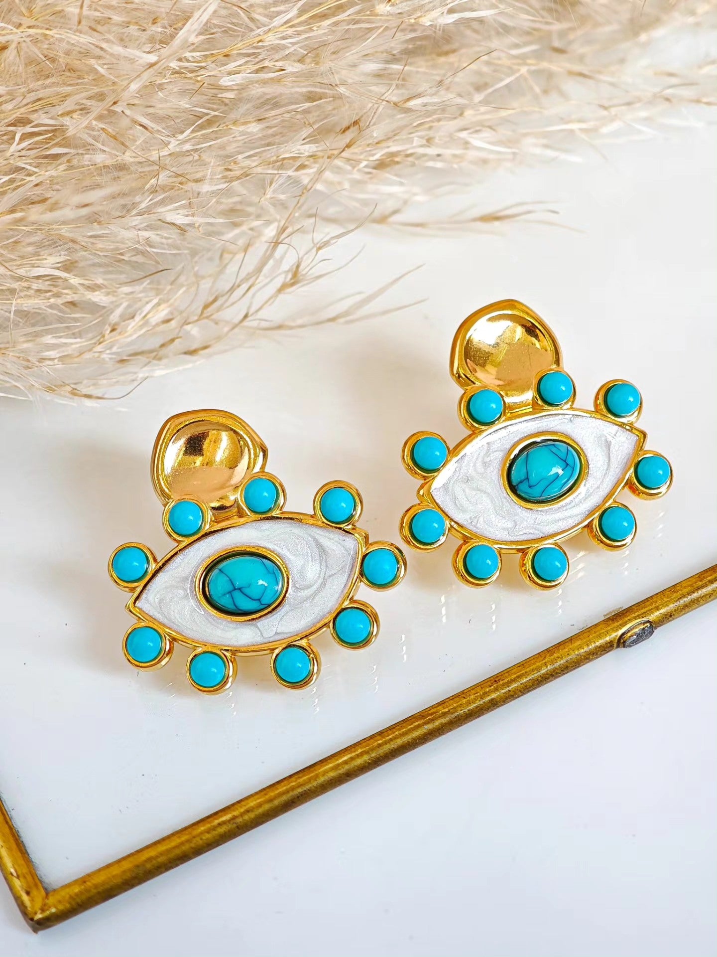 Aretes de Ojo con Bolitas