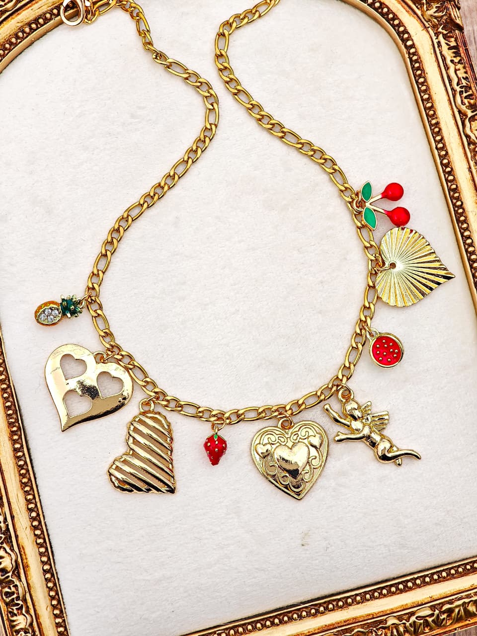 Collar Multi Dijes de Corazon con Querubin