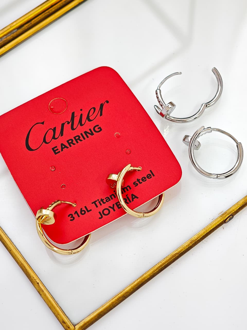 Aretes Clavo Cartier