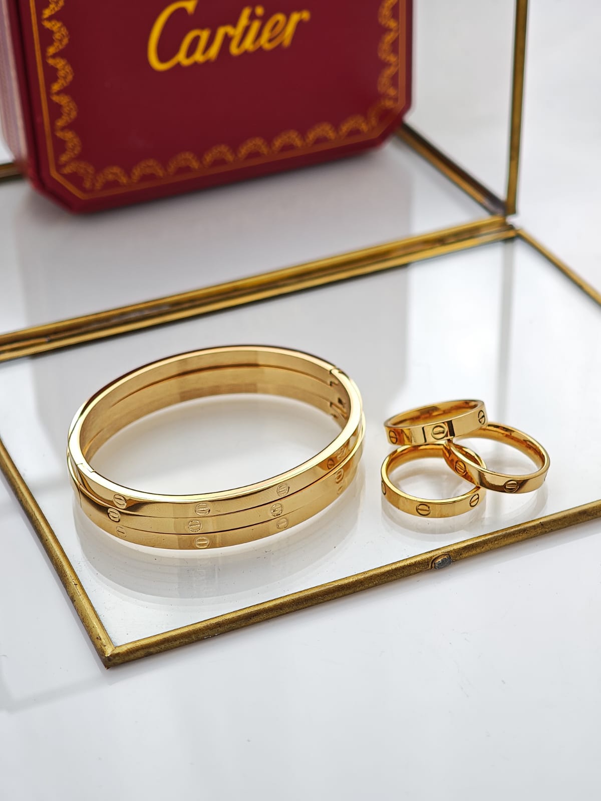 Set de Brazaletes y Anillos Cartier