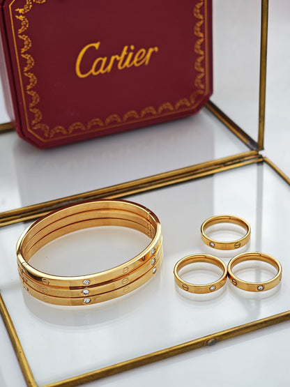 Set de Brazaletes y Anillos Cartier
